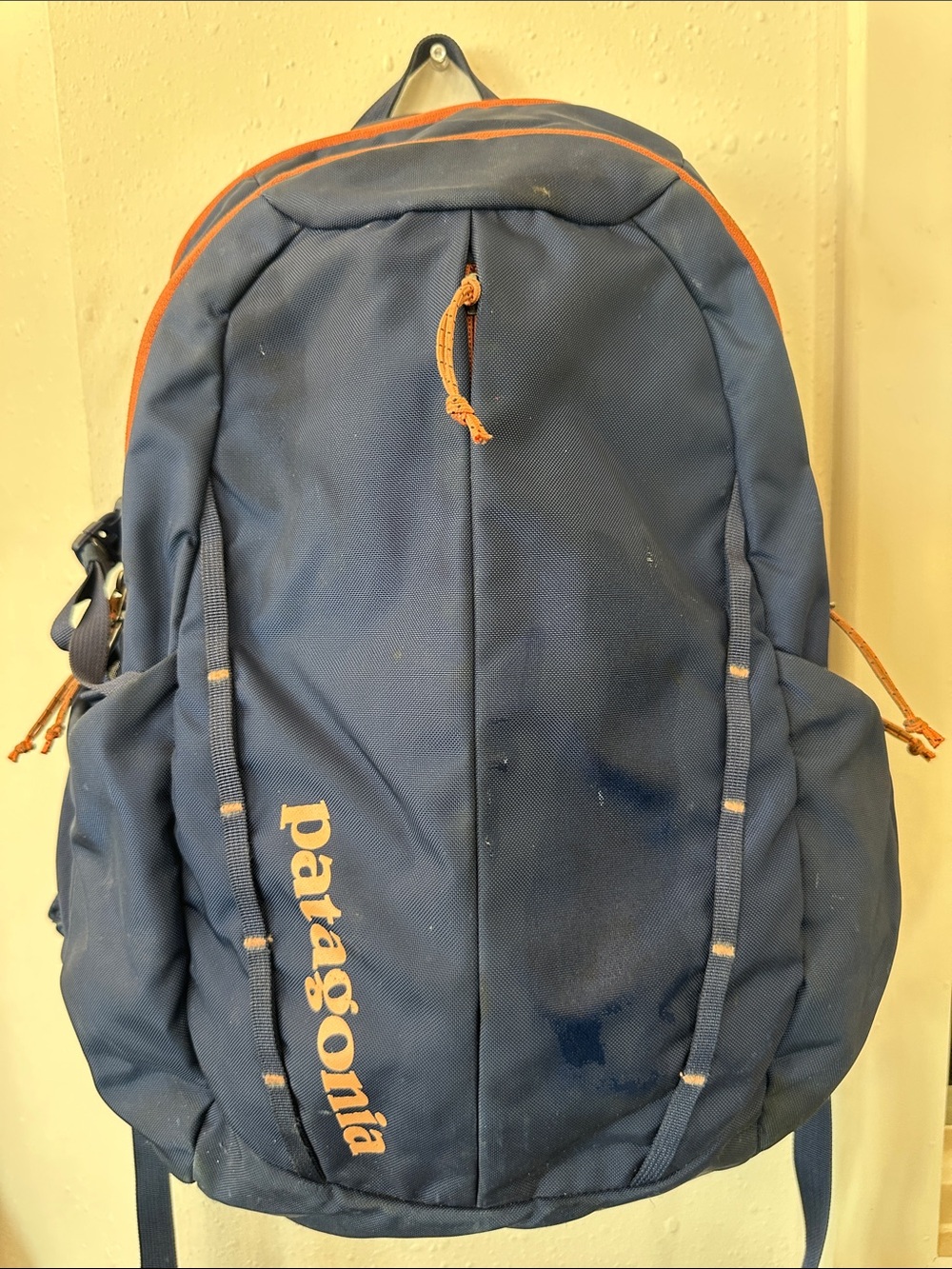 Patagonia Refugio pack 26l navy blue backpack with orange accents